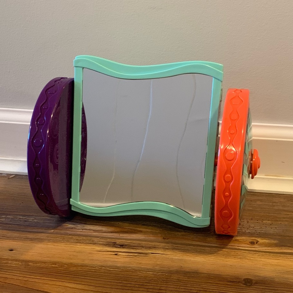 B. Baby Looky Rolling Sensory Mirror Crawling Toy
